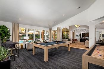 Large living room with a pool table